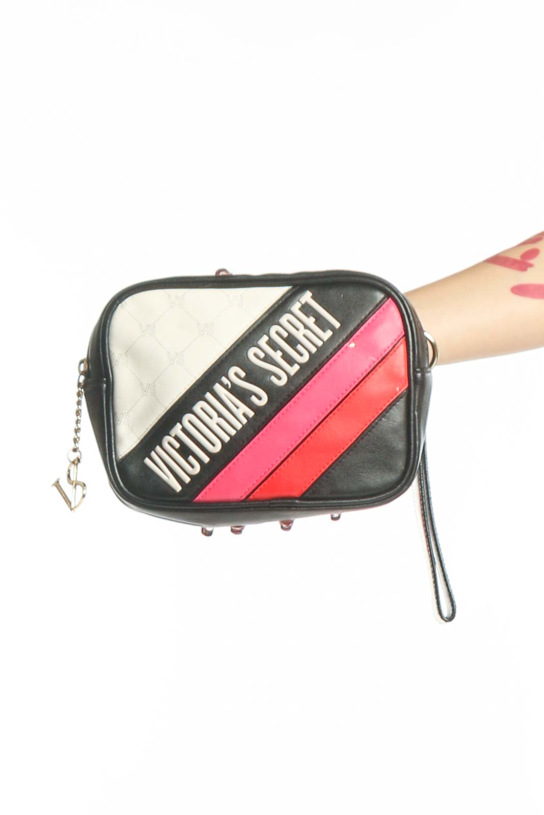 Black, white, and pink Victoria's Secret crossbody bag with quilted design and signature branding, shown from front view