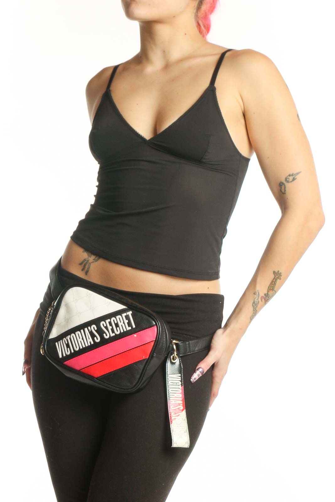 Black, white, and pink Victoria's Secret crossbody bag with quilted design and signature branding, shown from front view