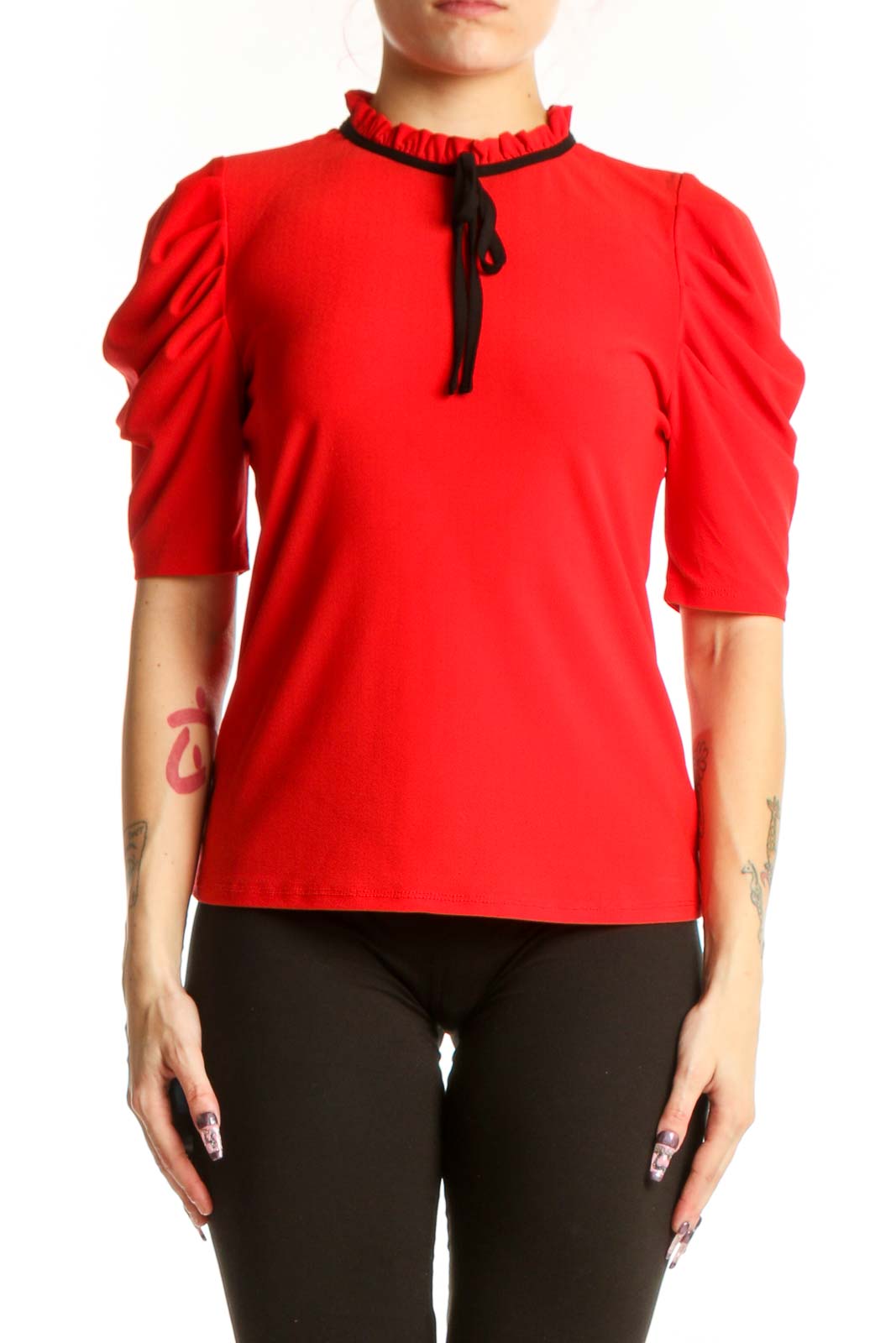 Red puff sleeve top with ruched neckline and black tie detail, front view