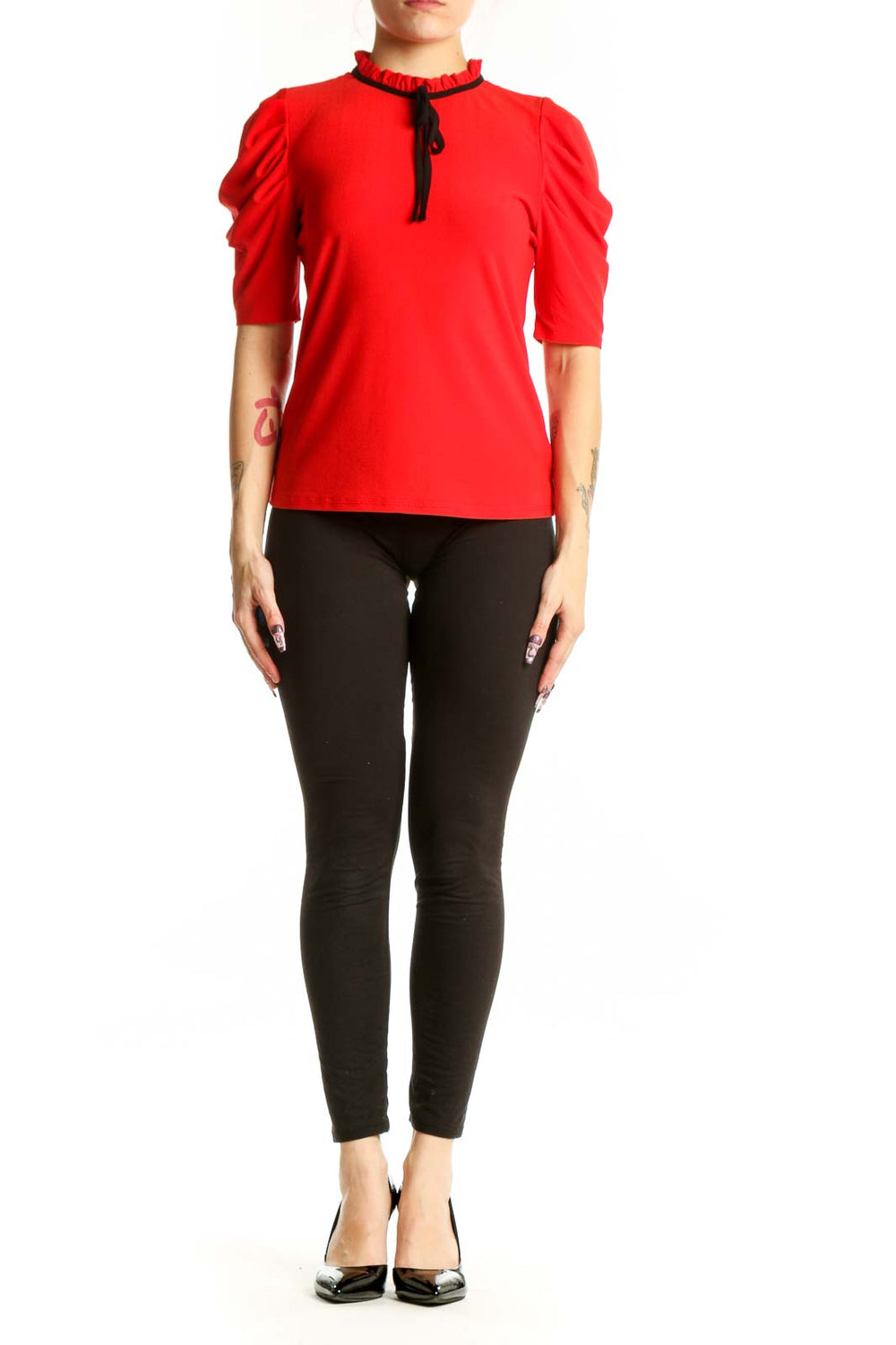 Red puff sleeve top with ruched neckline and black tie detail, front view