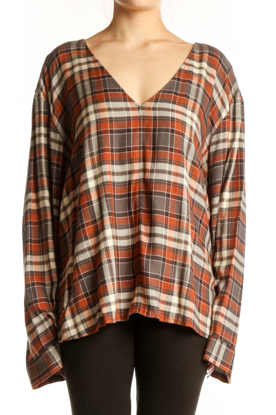 Orange and cream plaid V-neck long sleeve top with oversized fit, front view