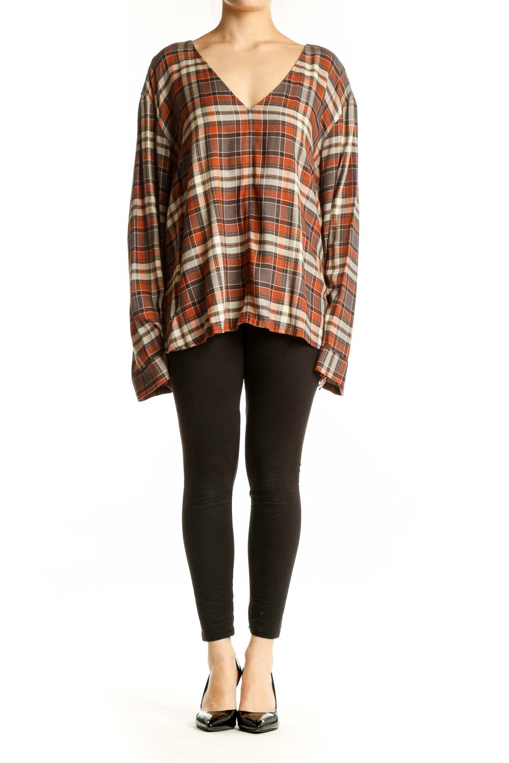 Orange and cream plaid V-neck long sleeve top with oversized fit, front view