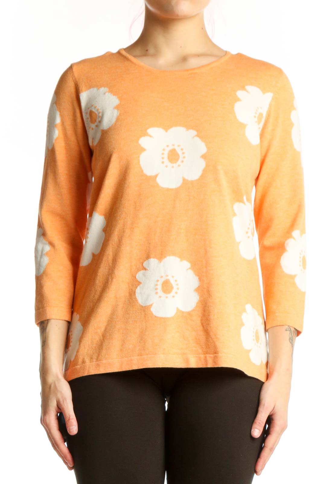 Orange floral print top with white daisy pattern, three-quarter sleeves, crew neckline, front view on model