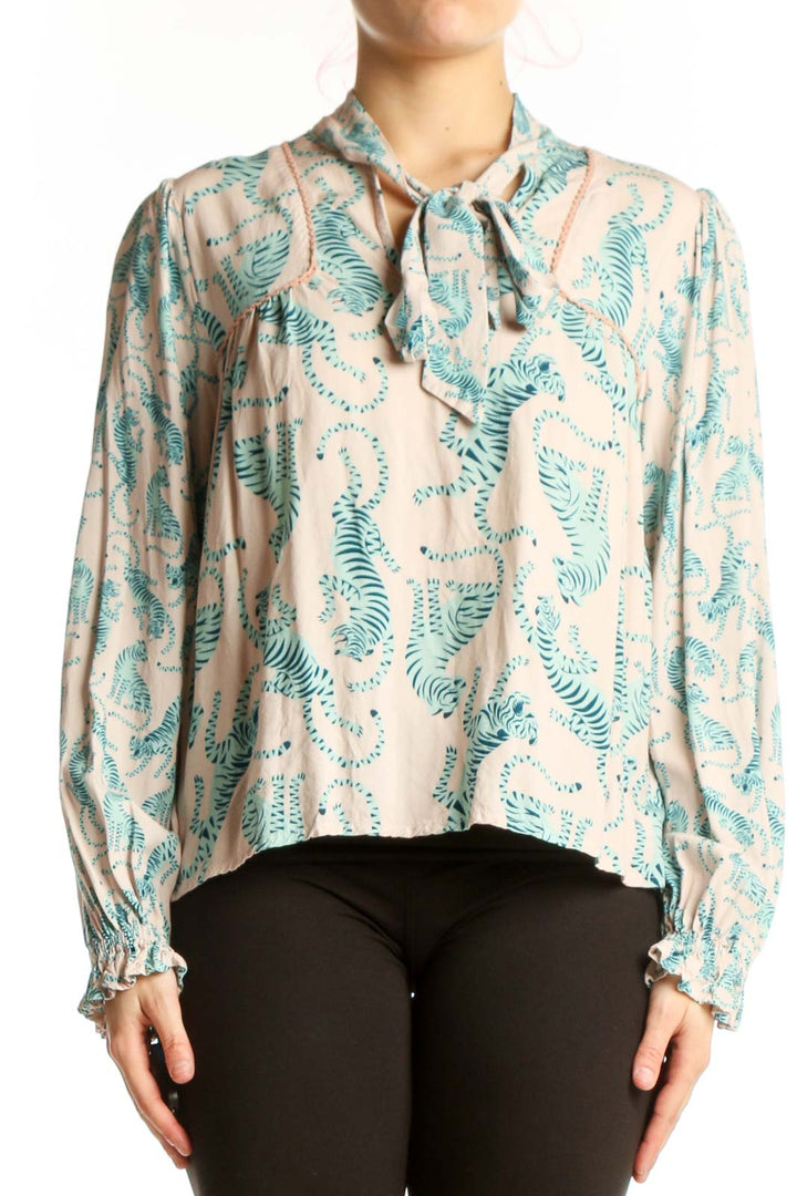 Cream fern print viscose blouse with teal botanical pattern and tie-neck detail, front view