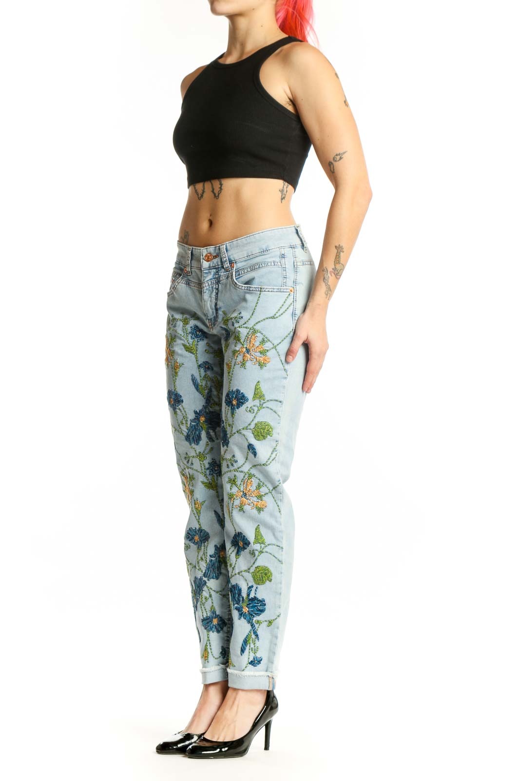 Light blue floral printed denim jeans front view with botanical flower design