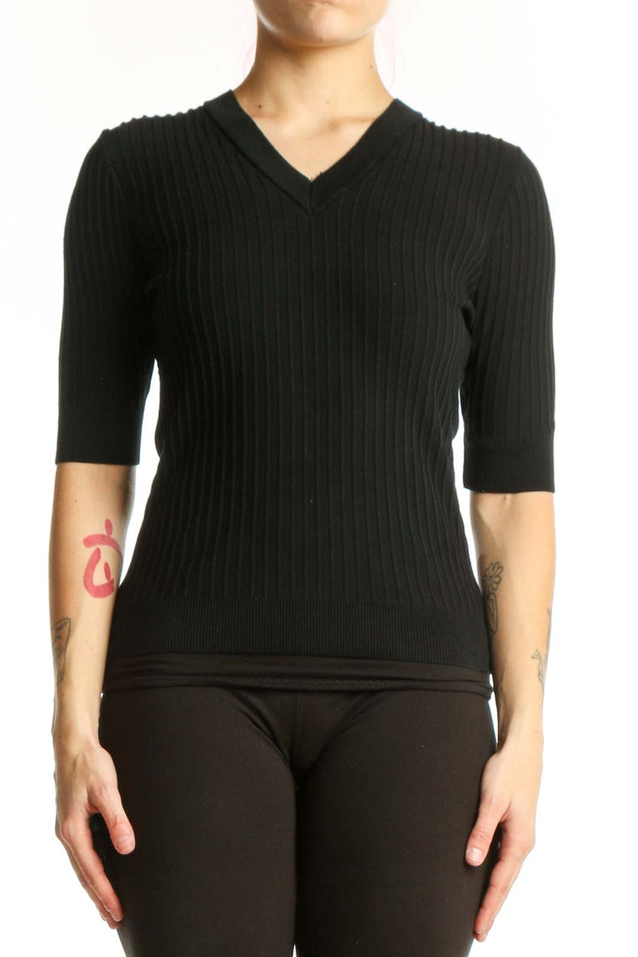 Black ribbed V-neck half sleeve top by Elie Tahari, front view on model