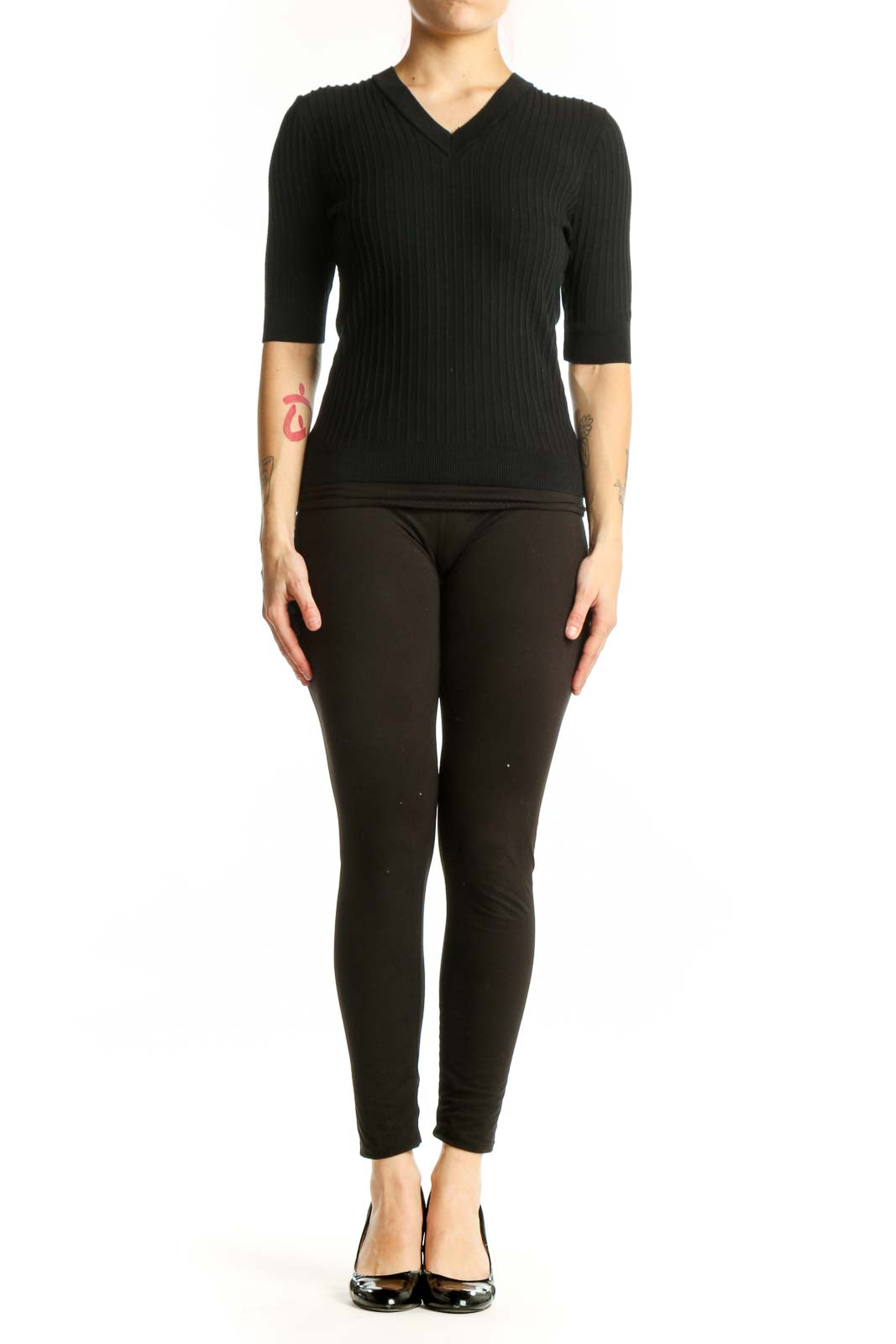 Black ribbed V-neck half sleeve top by Elie Tahari, front view on model