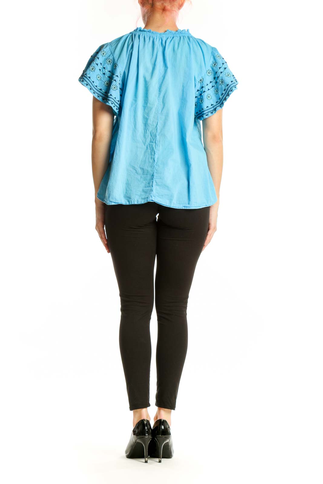 Blue cotton top with ruffled lace sleeves, back view on model