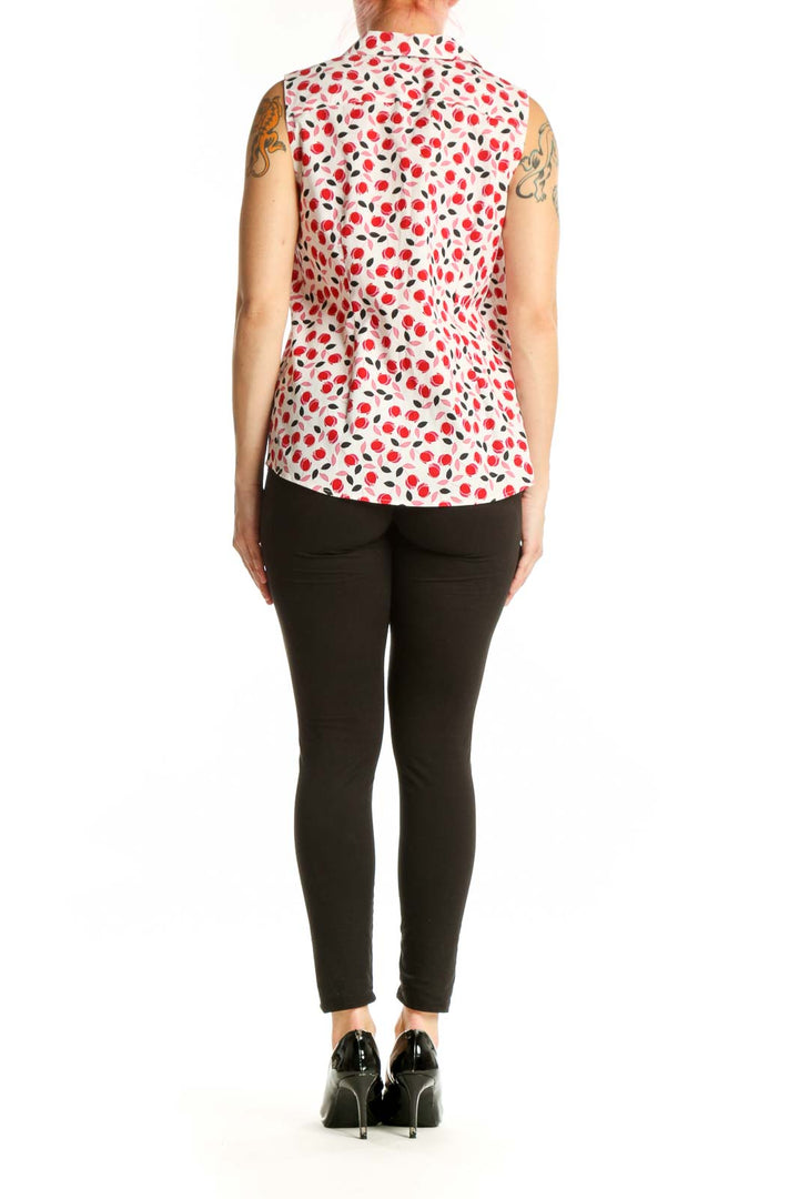 Red and white floral sleeveless button-up top by Talbots, back view on model