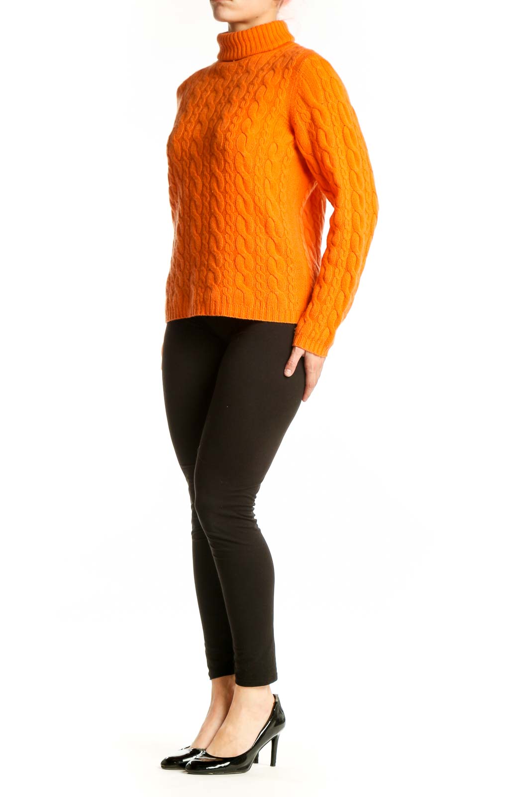 Orange cashmere cable knit turtleneck by DonCaster, front view showing intricate textured pattern and classic turtleneck collar