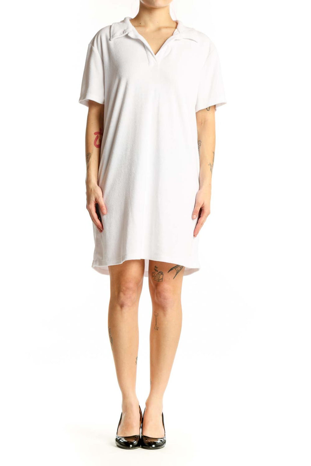 White polo shirt dress with short sleeves and collar, front view on model