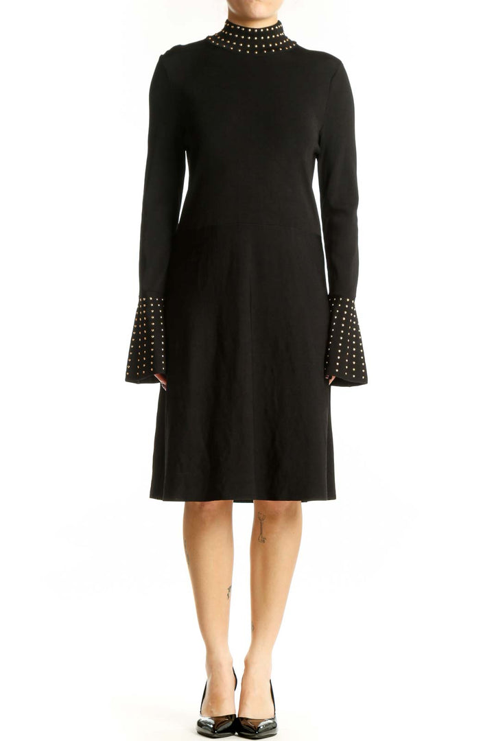 Black studded mock neck midi dress with bell cuffs, front view