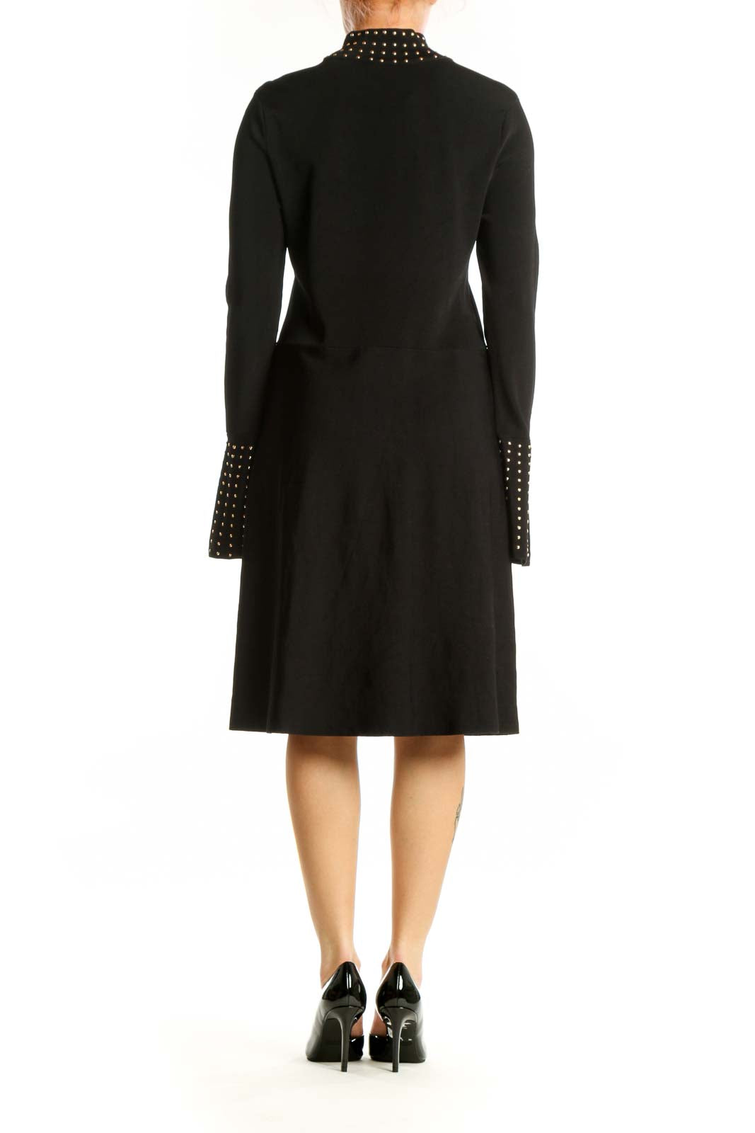 Black studded mock neck midi dress with bell cuffs, back view