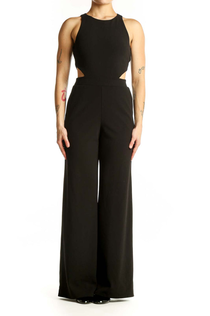 Black cutout jumpsuit with halter neckline and wide-leg pants, front view