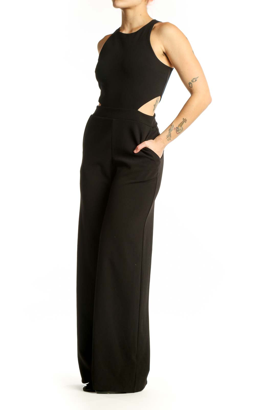 Black cutout jumpsuit with halter neckline and wide-leg pants, front view