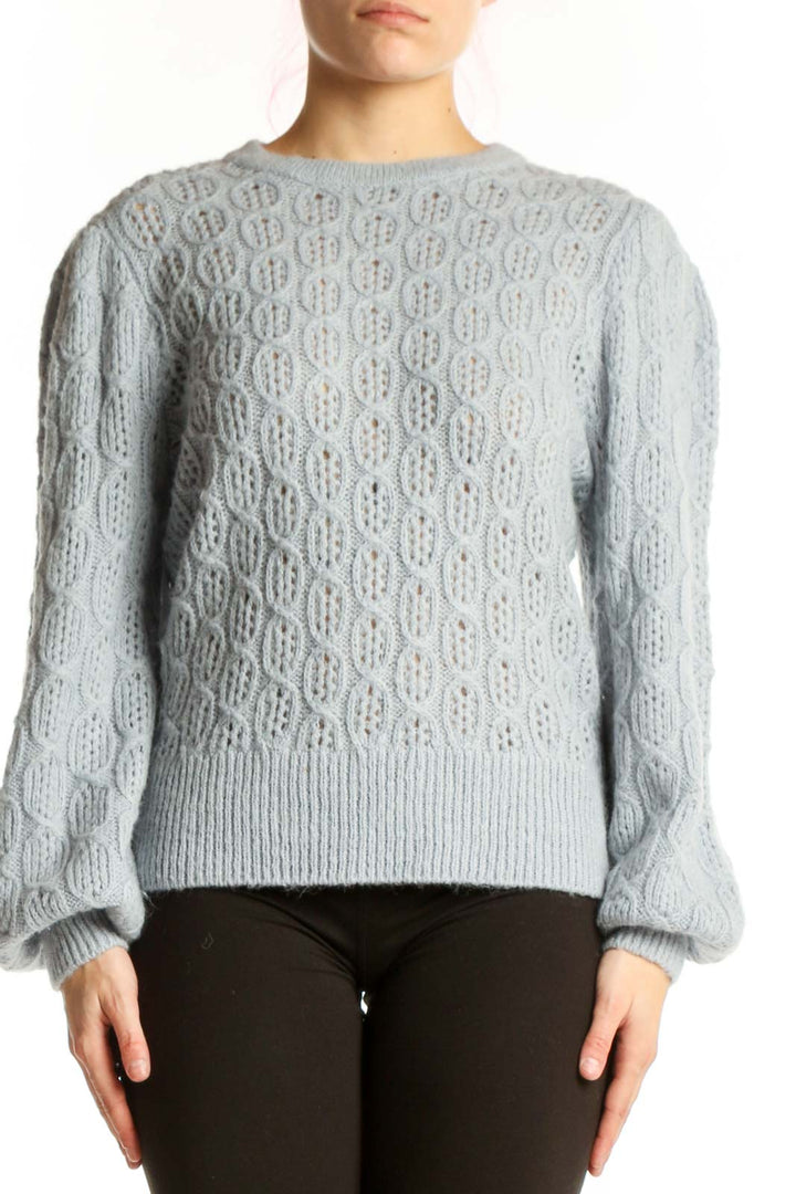 Gray cable knit pullover sweater with intricate pattern and puffed sleeves, front view