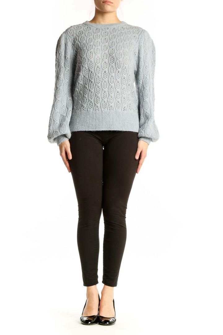 Gray cable knit pullover sweater with intricate pattern and puffed sleeves, front view