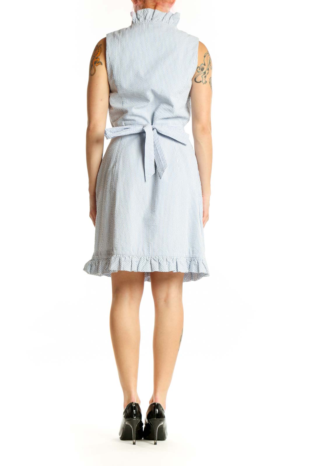 Blue and white striped cotton wrap dress with ruffle trim and functional pockets, back view