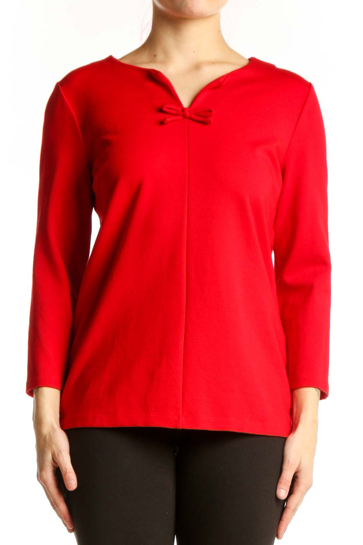 Red long sleeve top with bow neckline detail, front view on model