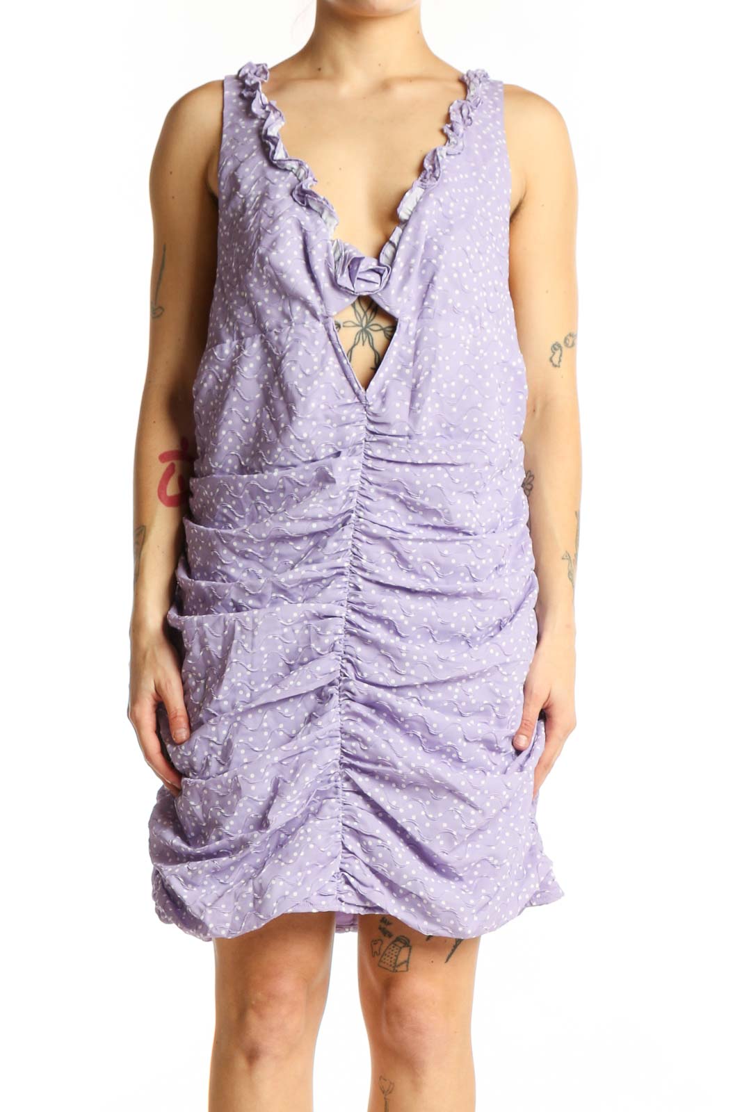 Lavender polka dot ruched dress with V-neckline and ruffled trim, front view