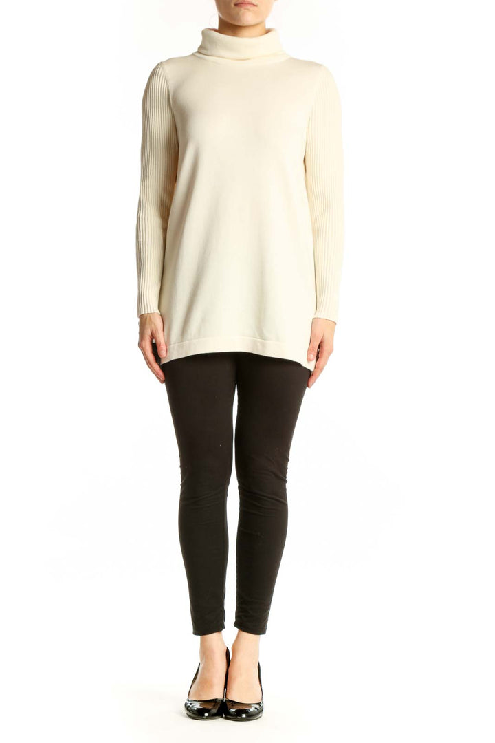 Front view of cream Pima Cotton turtleneck knit sweater with ribbed long sleeves by Edinburgh Knitwear