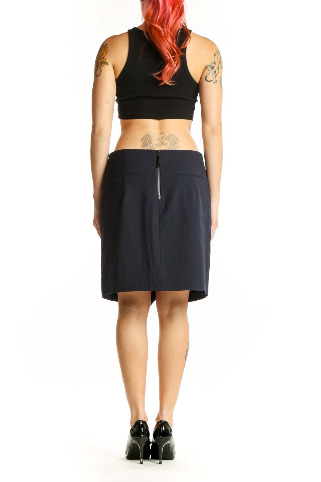 Navy wrap knee-length skirt back view showing wrap design and fit
