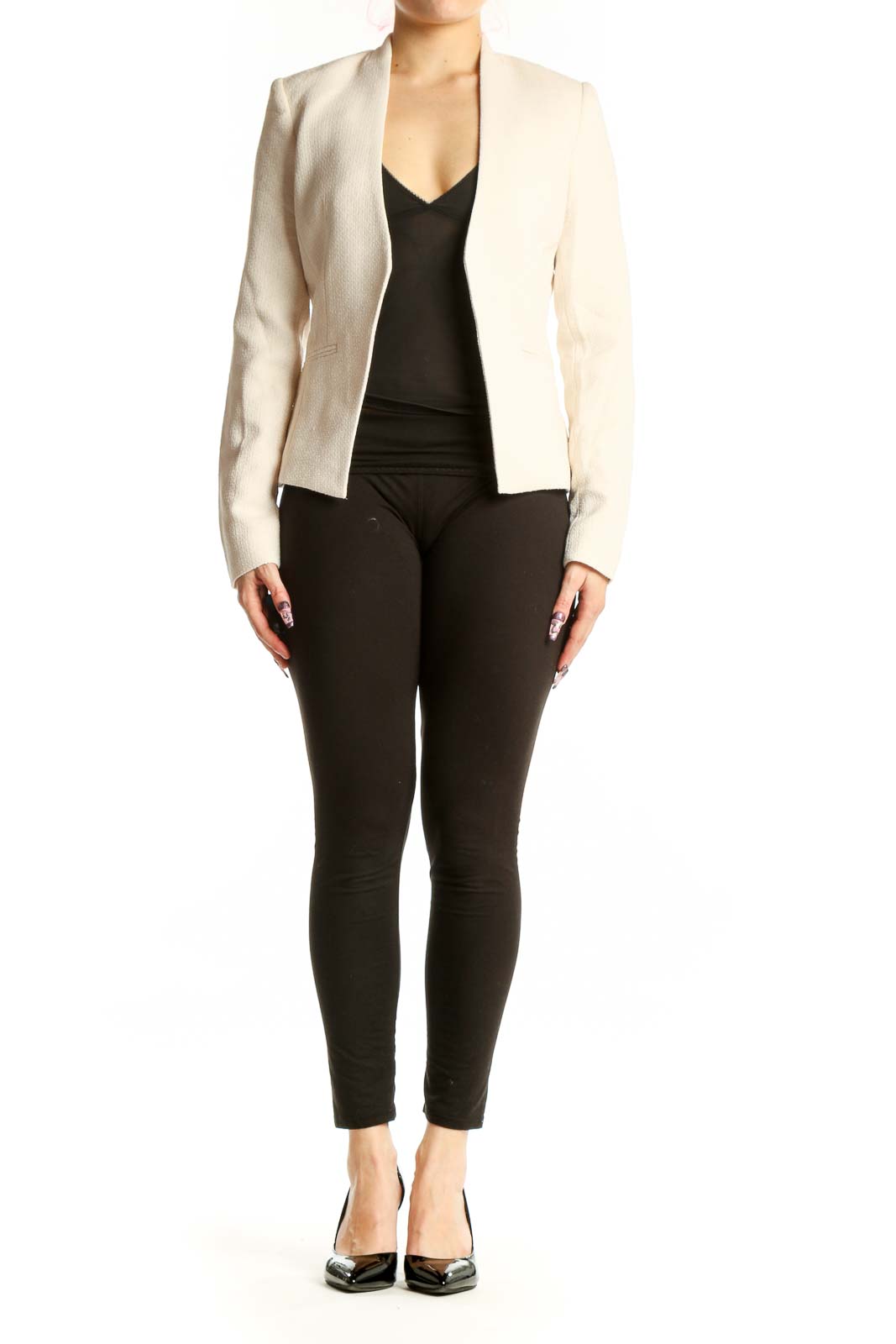 Front view of cream polyester blazer by Calvin Klein, XS size, featuring open-front tailored design and long sleeves