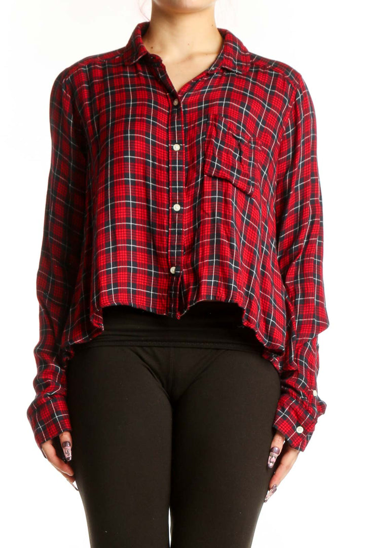 Red plaid viscose button-up shirt with cropped fit, front view on model