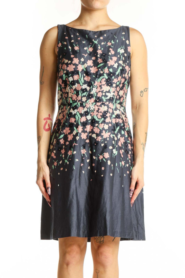 Navy floral A-line midi dress with pink and cream floral print, sleeveless crew neck design, front view