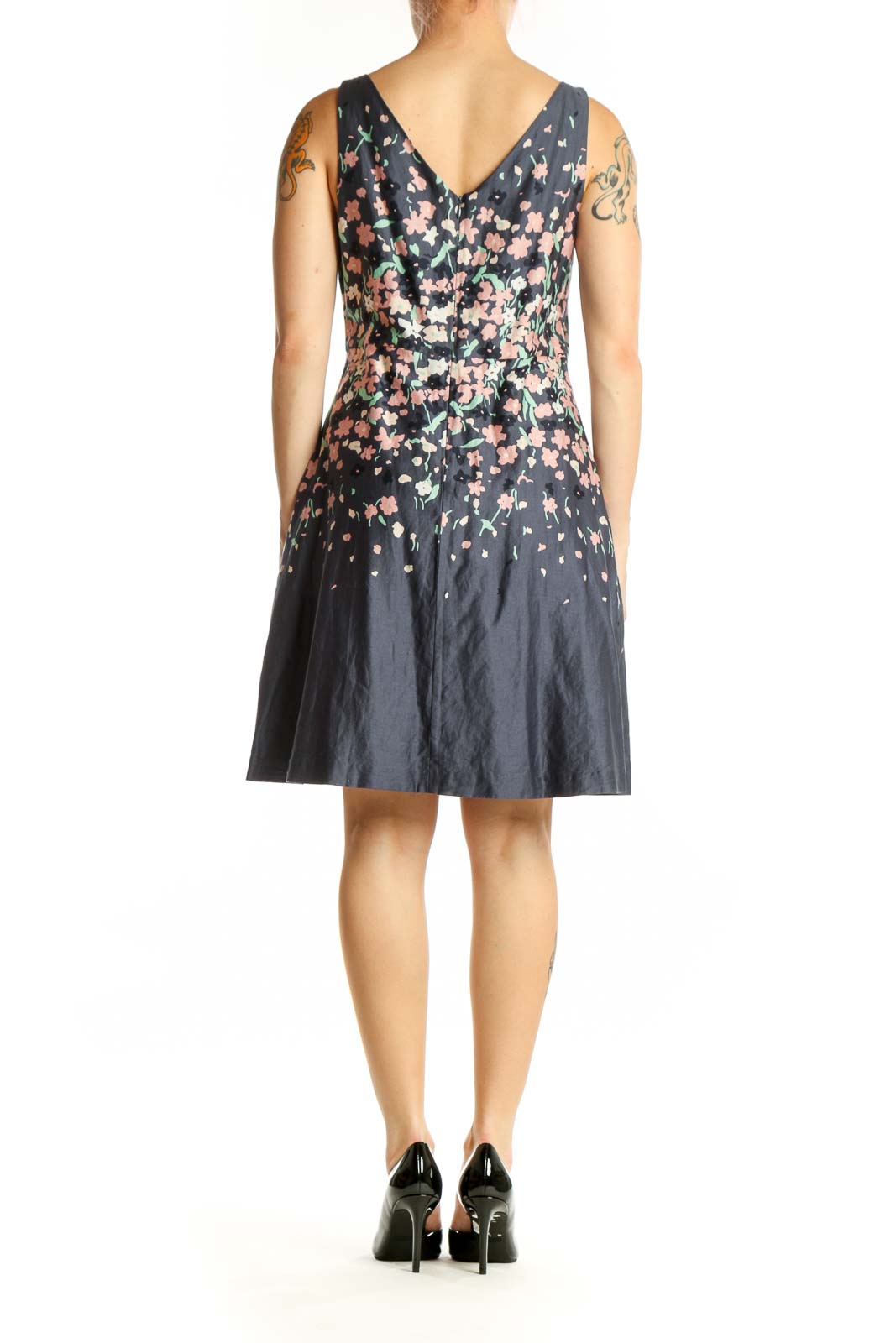 Navy floral A-line midi dress with pink and cream floral print, sleeveless crew neck design, back view