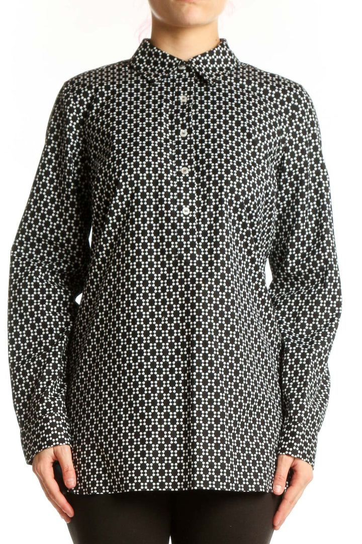Black and white geometric print button-up shirt with long sleeves and collared neckline, front view