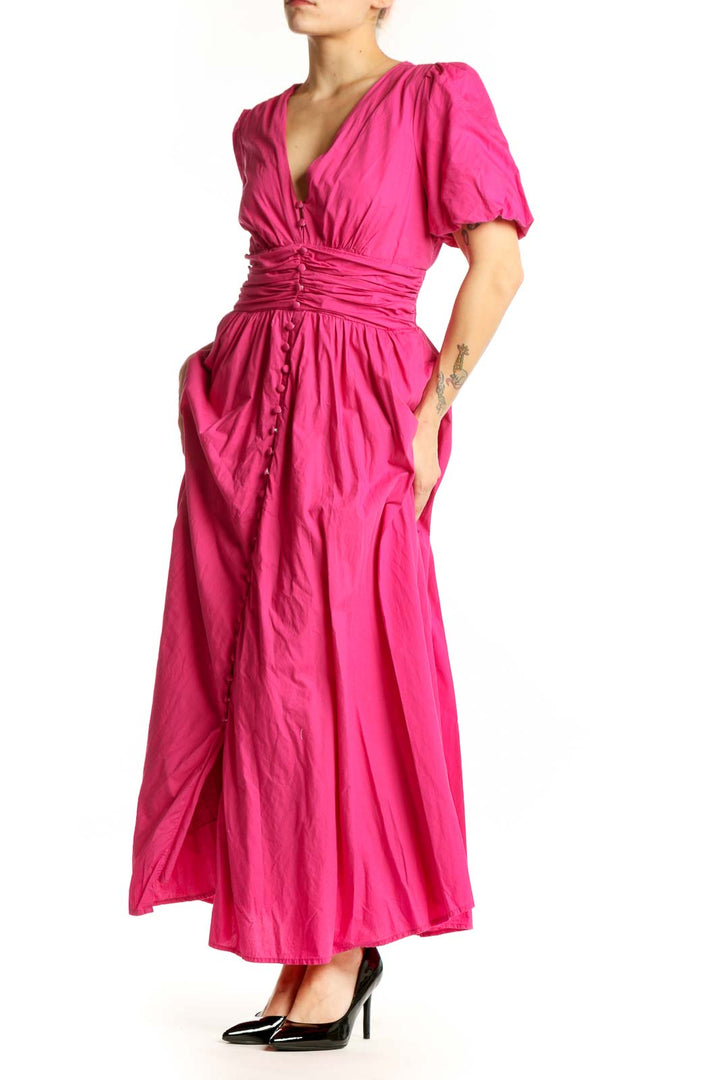 Pink puff sleeve maxi dress with V-neckline and ruched waist detailing, front view