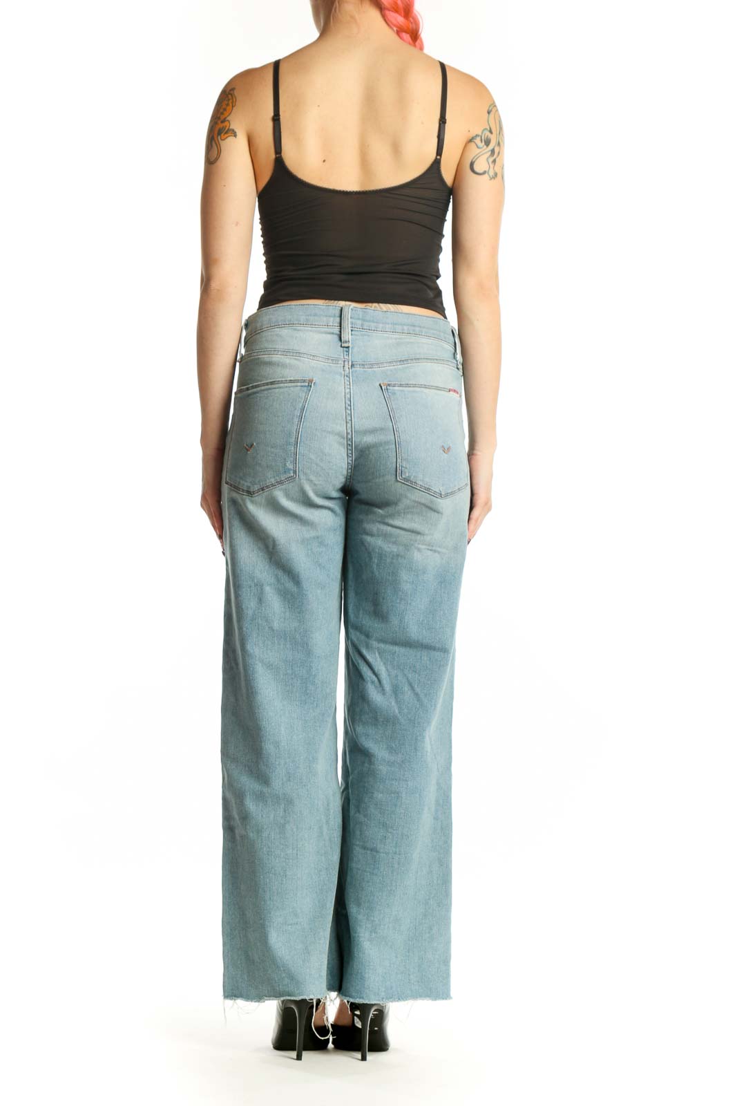 Back view of light blue distressed wide-leg Hudson Jeans showing relaxed fit and sustainable fabric blend