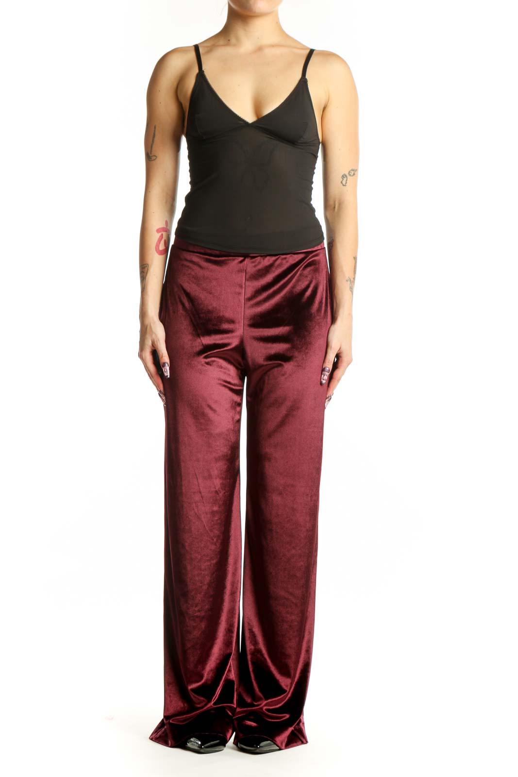 Front view of burgundy velvet wide-leg pants with high waistband and flowing silhouette