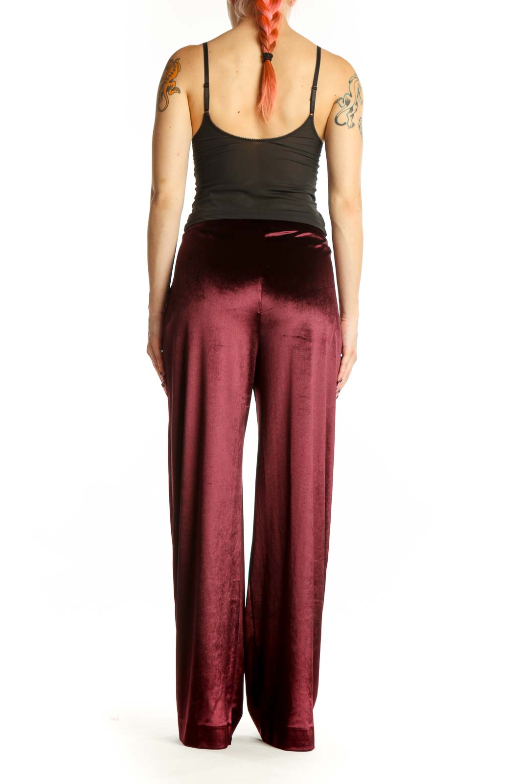 Back view of burgundy velvet wide-leg pants showing the elegant drape and full-length cut