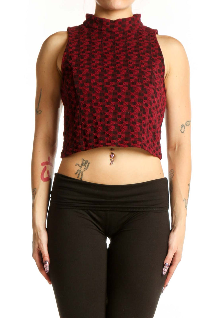 Burgundy textured cropped tank top with high neckline, front view on model
