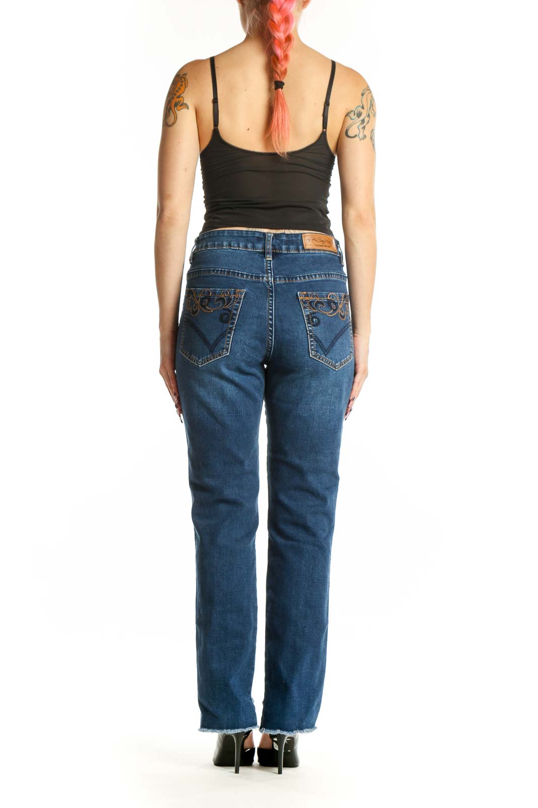 Back view of blue denim straight-leg jeans with side slit detail by Suzanne Betro