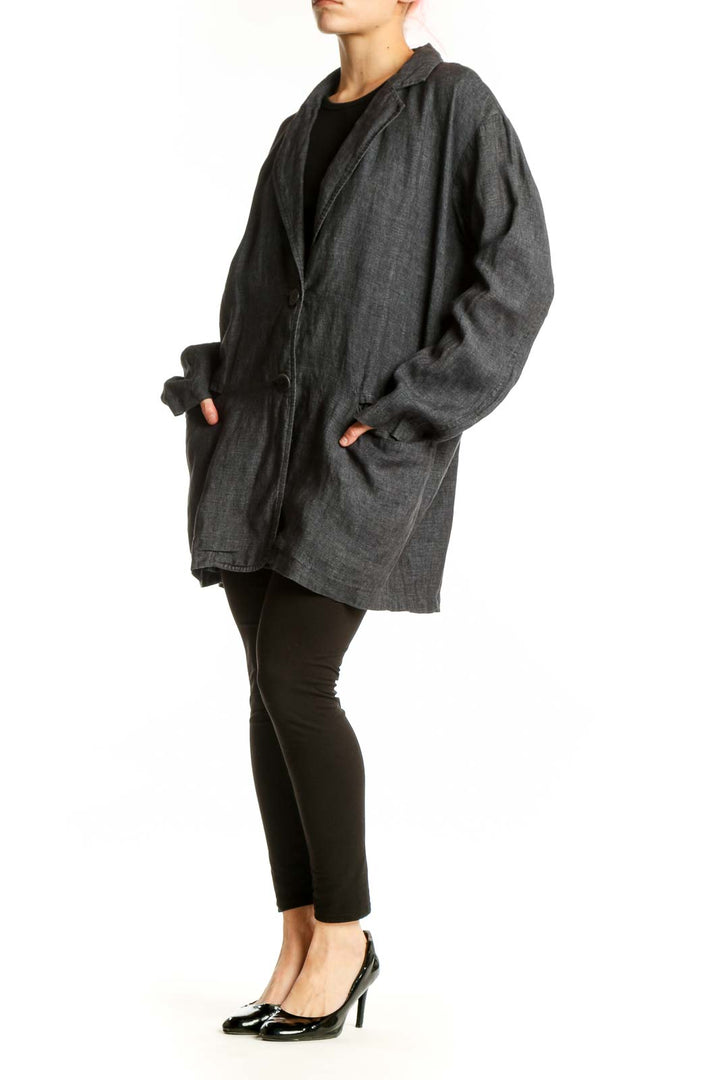 Charcoal organic linen blazer by Eileen Fisher with two-button closure and notched lapels, front view