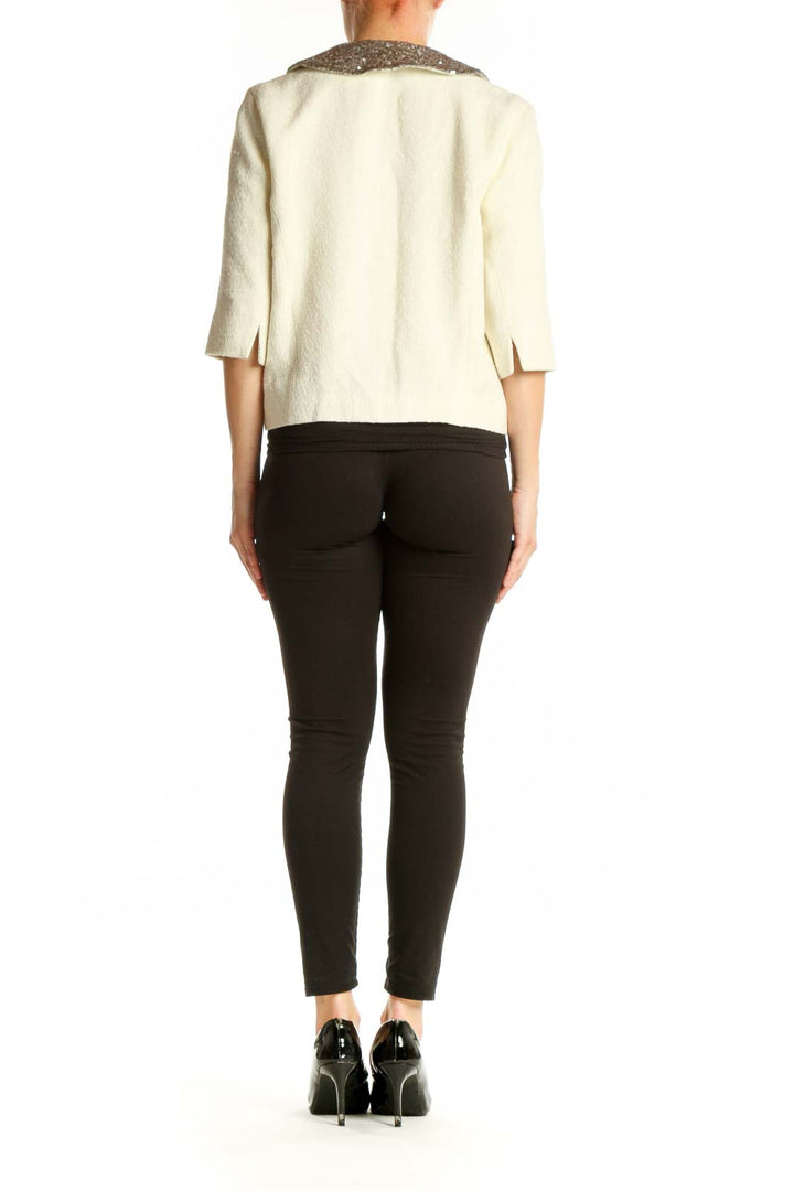 Cream wool blend jacket with sequin collar detail, back view