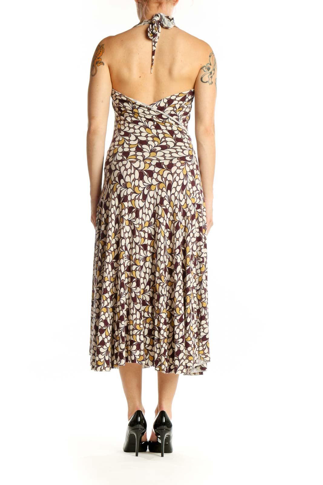 Brown floral halter midi dress with A-line silhouette and flowing skirt, back view