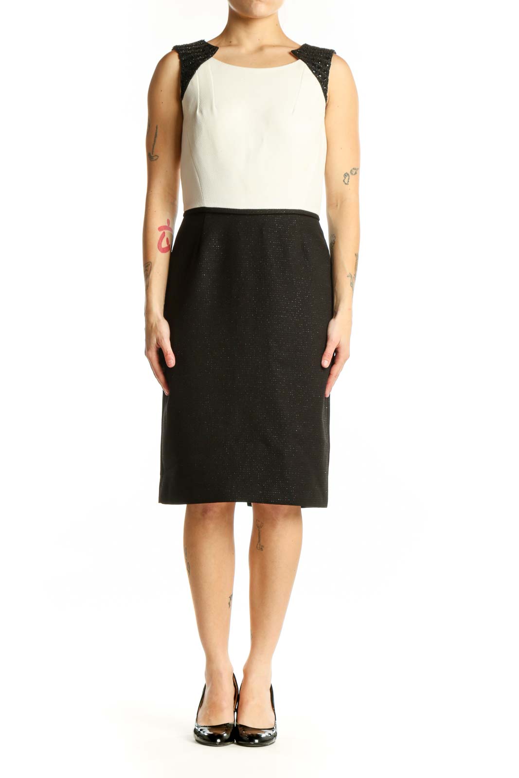 Black and cream Tahari color block sheath dress with sparkly black shoulder panels, front view