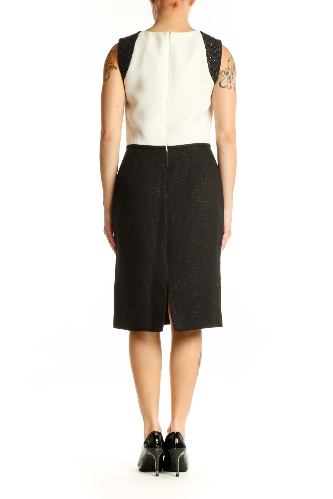 Black and cream Tahari color block sheath dress with sparkly black shoulder panels, back view