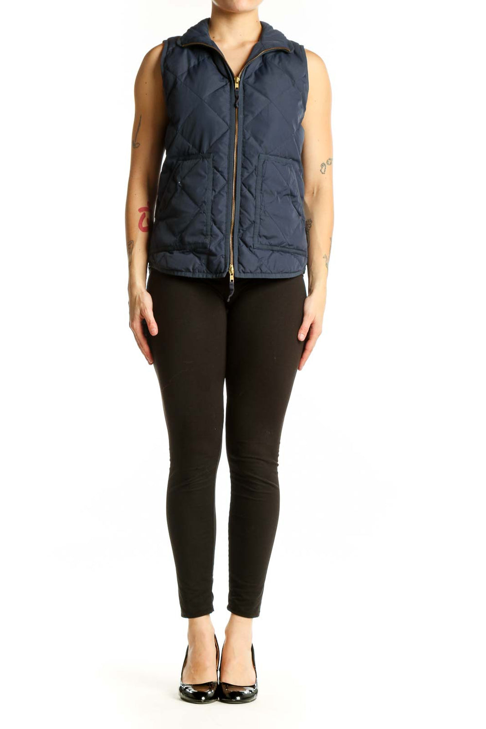 Navy quilted puffer vest with diamond quilted pattern and gold-tone zipper closure, front view