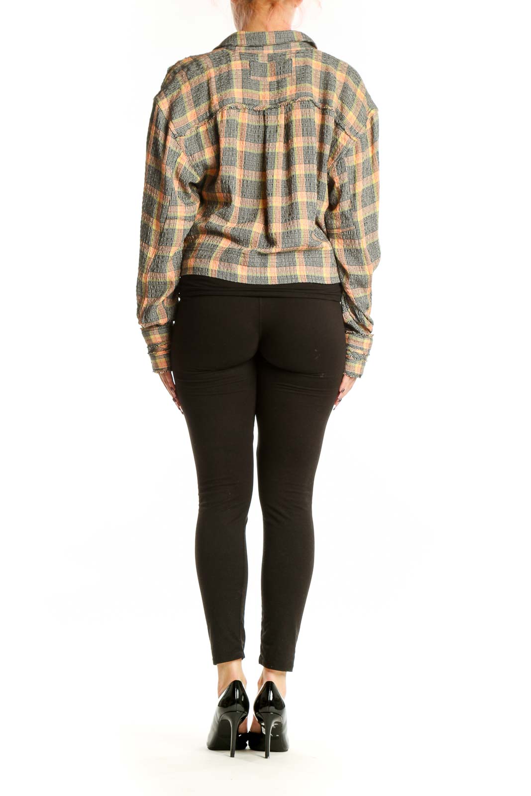 Back view of multicolor plaid button-up shirt showing tie-front detail and relaxed fit silhouette