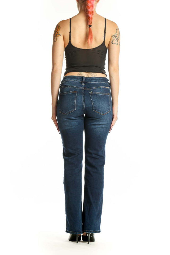Back view of Kancan blue flare denim jeans showing flattering flare silhouette and traditional pocket styling