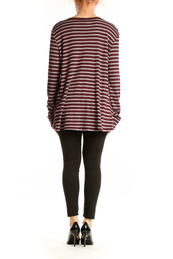 Burgundy and cream striped V-neck long sleeve top by Michael Stars, back view on model