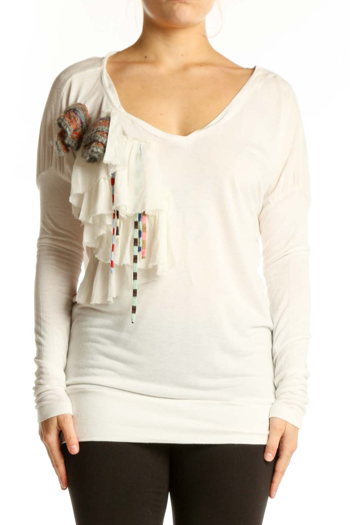 Cream viscose long-sleeve top by M Missoni with V-neckline and colorful tassel embellishment on front