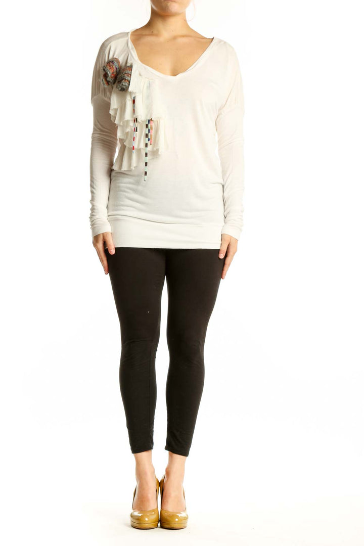 Cream viscose long-sleeve top by M Missoni with V-neckline and colorful tassel embellishment on front