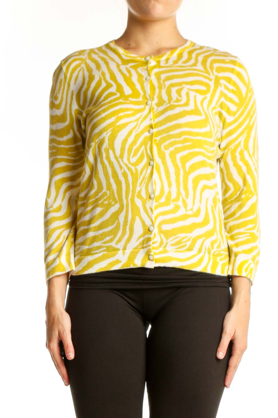 Yellow and cream zebra print Pima cotton cardigan with button-front closure and three-quarter sleeves, worn with black pants
