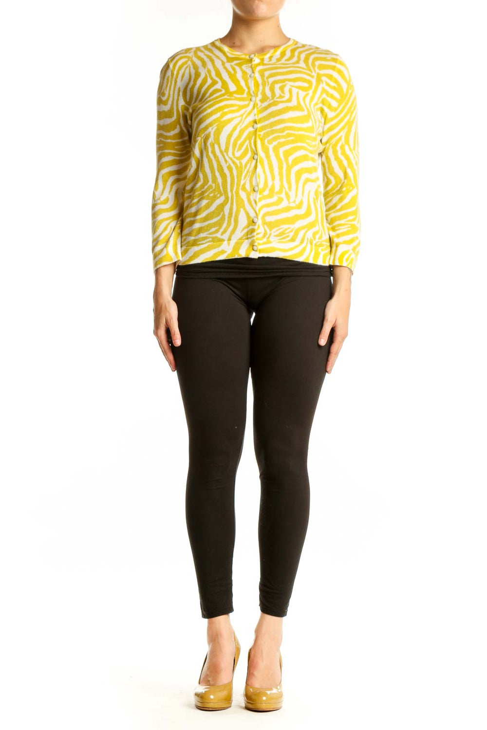 Yellow and cream zebra print Pima cotton cardigan with button-front closure and three-quarter sleeves, worn with black pants